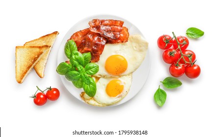 Full American Breakfast With Fried Eggs And Roasted Bacon On White Background. Top View.