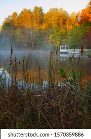 Full Autumn Color On Tranquil Pond In The Blue Ridge Mountains