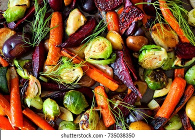 Full background of roasted colorful autumn vegetables, above view - Shutterstock ID 735038350