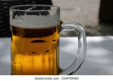 Full Beer Mug On Outdoor Table Stock Photo 2149709465 | Shutterstock