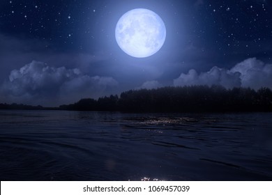 Full Blue Moon Over River Stock Photo 1069457039 | Shutterstock