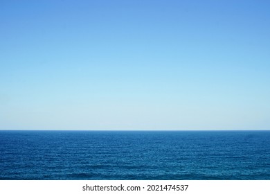 a full blue seascape of black sea from sardala cove - kandira - kocaeli - turkiye. three tones of blue seen as three layers at sea and sky.