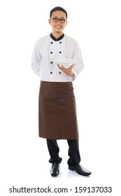 Full Body Asian Chef Holding An Empty Plate, Standing Isolated On White Background.