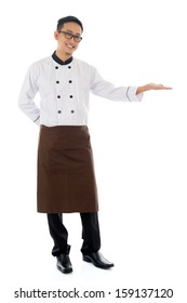 Full Body Asian Male Chef Hand Showing Blank Space, Standing Isolated White Background.