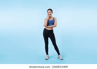 Full body asian woman in sportswear portrait, smiling and posing cheerful gesture. Workout training with attractive girl engage in her pursuit of healthy lifestyle. Isolated background Vigorous - Shutterstock ID 2360013409