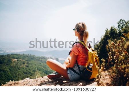Similar – Image, Stock Photo Anonymous woman with backpack in boarding bridge