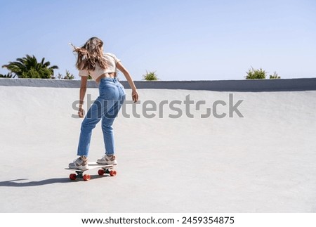Similar – Image, Stock Photo Back view of anonymous female hiker in shorts and backpack walking on narrow footbridge while trekking in forest during weekend holiday