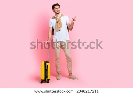 Full body cadre of young businessman enjoy travel cheap tickets lowcost airport direct finger mockup isolated on pink color background