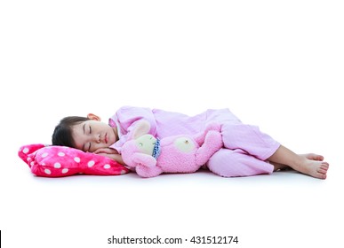 Full Body. Healthy Children Concept. Asian Child Sleeping Peacefully. Adorable Girl In Pink Pajamas Taking A Nap. Isolated On White Background.