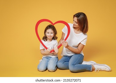 Full Body Length Happy Woman In Basic White T-shirt Have Fun Sit On Floor Child Baby Girl 5-6 Years Old Mom Mum Little Kid Daughter Isolated On Yellow Color Background Studio Mother's Day Love Family