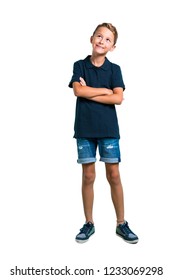 Full Body Of Little Boy Stand And Looking Up On White Background