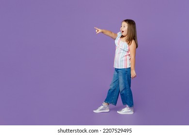 Full body little kid child girl 6-7 years old wear casual clothes point index finger aside on workspace area isolated on plain pastel light purple background Mother's Day love family lifestyle concept - Shutterstock ID 2207529495