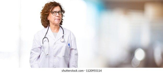 Full Body Middle Age Doctor Woman Doubting And Confused, Thinking Of An Idea Or Worried About Something