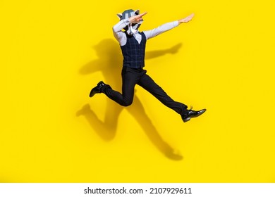 Full Body Photo Of Absurd Surreal Wacky Guy Racoon Mask Jump Dance Dabber Wear Trendy Outfit Isolated Over Yellow Color Background