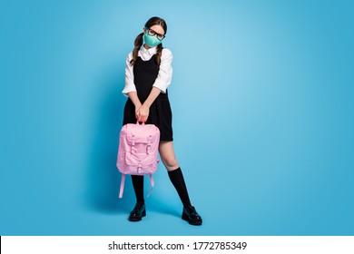 Full Body Photo Of Attractive High School Girl Hold Rucksack Enjoy Graduate Campus Lesson Lecture Wear Medical Mask White Blouse Black Skirt Isolated Over Blue Color Background