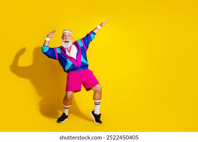 Full body photo banner of funny senior sportsman dance golden medal dressed stylish retro sport costume isolated on yellow color background - Powered by Shutterstock