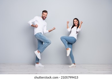 Full Body Photo Of Cool Millennial Couple Yell Wear Shirt Jeans Footwear Isolated Concrete Grey Color Wall Background