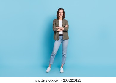 Full body photo of cool satisfied glad lady stand with folded arms wear khaki clothes isolated over sky light color background - Shutterstock ID 2078220121