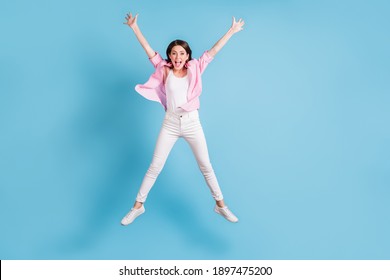 Full Body Photo Of Impressed Cheerful Lady Jump High Star Figure Open Mouth Isolated On Blue Color Background