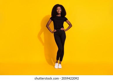 Full Body Photo Of Millennial Young Lady Stand Wear Black Cloth Isolated On Yellow Color Background