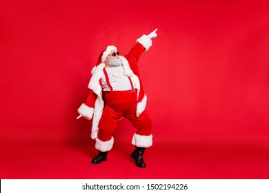 Full body photo of overweight carefree delightful ecstatic active energetic listening hip-hop music chic grandfather pointing finger up enjoying rhythm movement has big belly isolated vivid background - Powered by Shutterstock