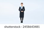 Full body photo of a woman in the customer service industry.