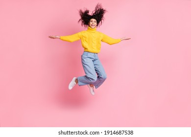 Full Body Photo Of Young Excited Hispanic Girl Have Fun Jump Up Hold Hands Isolated Over Pastel Color Background