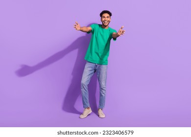 Full body photo of young friendly guy wear trendy outfit embracing you open arms welcome company isolated over purple color background