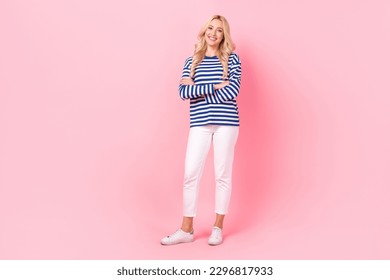 Full body photo of young girl wear striped pullover white pants folded arms enjoy her summer outfit isolated on pink color background
