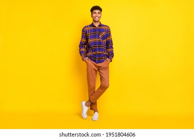 Full Body Photo Of Young Handsome Black Man Happy Positive Smile Hands In Pocket Confident Isolated Over Yellow Color Background