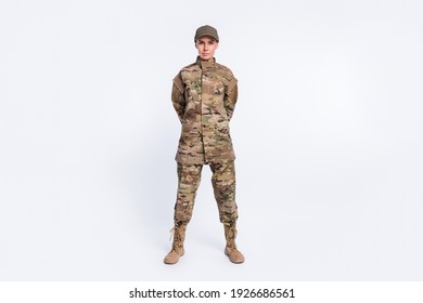 Full body photo of young woman confident soldier officer army camouflage uniform isolated over white color background - Powered by Shutterstock