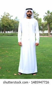 Full Body Portrait Of Arabic Business Man Wearing Kandora While His Both Hands On The Side