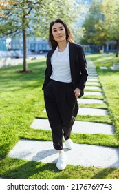 Full Body Portrait Of Asian Confident Business Woman In Suit, Walking In Business Center Spring Park