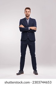 Full body portrait of business man, arms crossed with confidence isolated on studio background. Professional mindset, career success and mockup space with corporate male employee and leadership - Shutterstock ID 2303744653