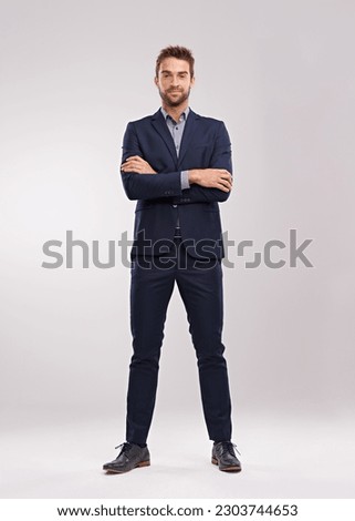 Full body portrait of business man, arms crossed with confidence isolated on studio background. Professional mindset, career success and mockup space with corporate male employee and leadership