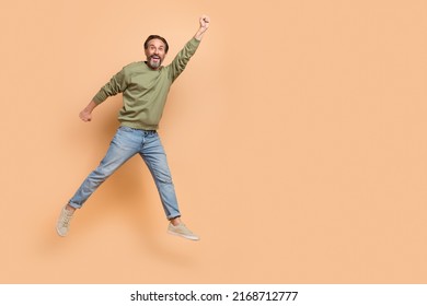 Full Body Portrait Of Cheerful Person Raise Arm Empty Space Travel Dream Isolated On Beige Color Background