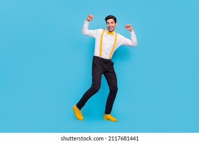Full body portrait of excited funny man enjoy vintage discotheque isolated on blue color background