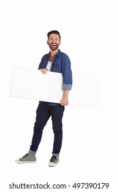 Full Body Portrait Of Mature Man Holding Blank Billboard And Smiling Over White Background