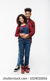 Full Body Portrait Of Young African American Hugging Couple, With Smile. Dating, Flirting, Lovers, Romantic Studio Concept, Isolated On White Background.