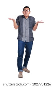 Full Body Portrait Of Young Asian Man Wearing Batik Shirt And Glasses Standing Shrug I Dont Know Innocent Gesture, Isolated On White