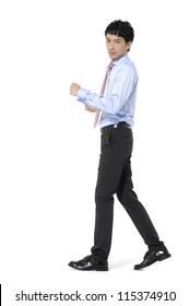 Full Body Portrait Of Young Business Man Walking