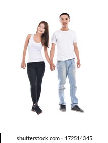 Full Body Portrait Of Young Couple Standing Together 