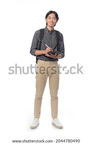 Full body portrait of young man with khaki pants with backpack on white background 