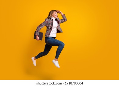 Full body profile photo of cheerful lady arm forehead look empty space isolated on yellow color background