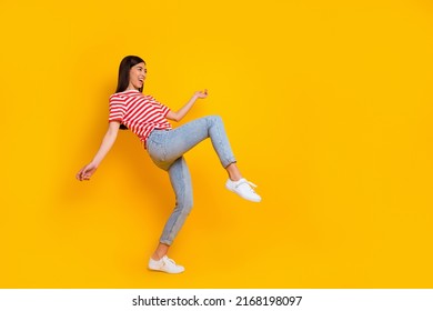 Full body profile photo of satisfied cheerful person enjoy clubbing partying dance isolated on yellow color background - Shutterstock ID 2168198097