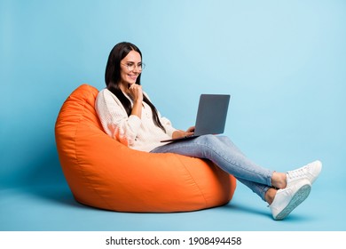 Full Body Profile Portrait Of Cheerful Person Hand On Chin Laptop Look Screen Isolated On Blue Color Background