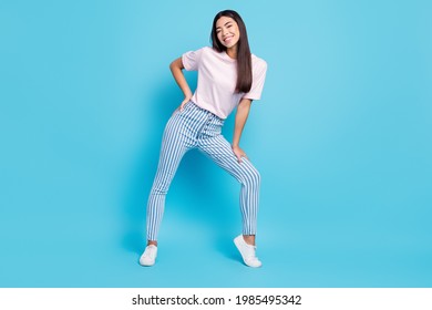 Full Body Profile Side Photo Of Young Asian Cheerful Girl Happy Positive Smile Lovely Isolated Over Blue Color Background