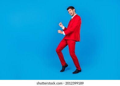 Full Body Profile Side Photo Of Young Man Happy Positive Smile Clubber Have Fun Dance Isolated Over Blue Color Background