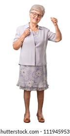 Full Body Senior Woman Listening To Music, Dancing And Having Fun, Moving, Shouting And Expressing Happiness, Freedom Concept