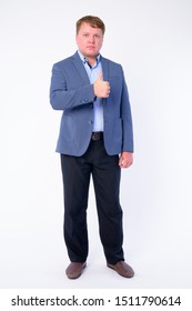 Full Body Shot Of Overweight Businessman In Suit Giving Thumbs Up